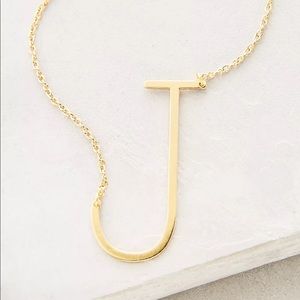 Sideways J Necklace by Anthropologie